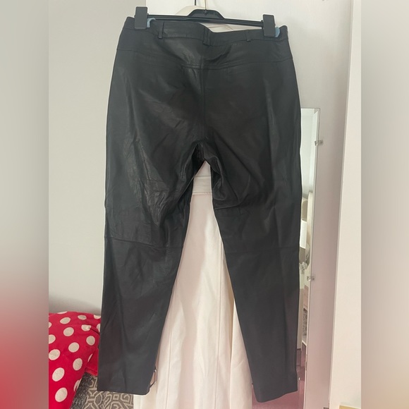 Worn once leather pants. Tapered at ankle. Button and zipper closure - Picture 2 of 2